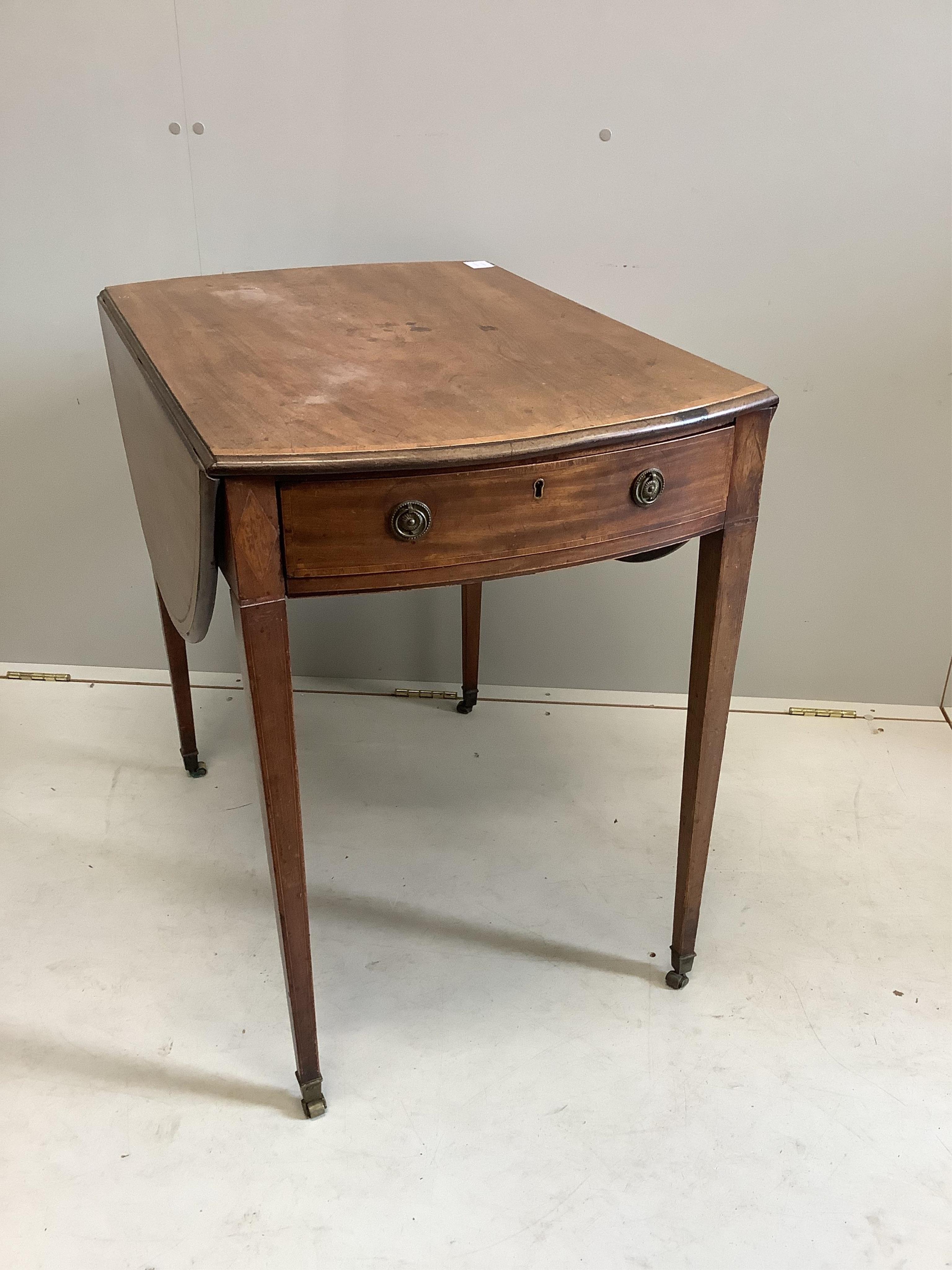 A George III mahogany and tulipwood banded oval topped Pembroke table, width 78cm, depth 53cm, height 73cm. Condition - poor
